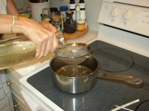 straining coconut water